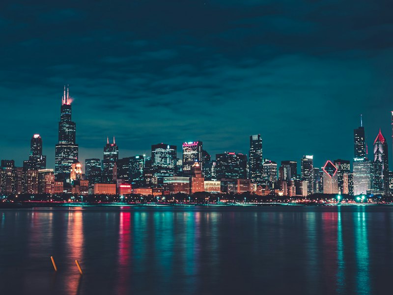 Chicago skyline at night across Lake Michigan